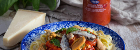 Tagliatelle a la marinera con tomate frito de temporada